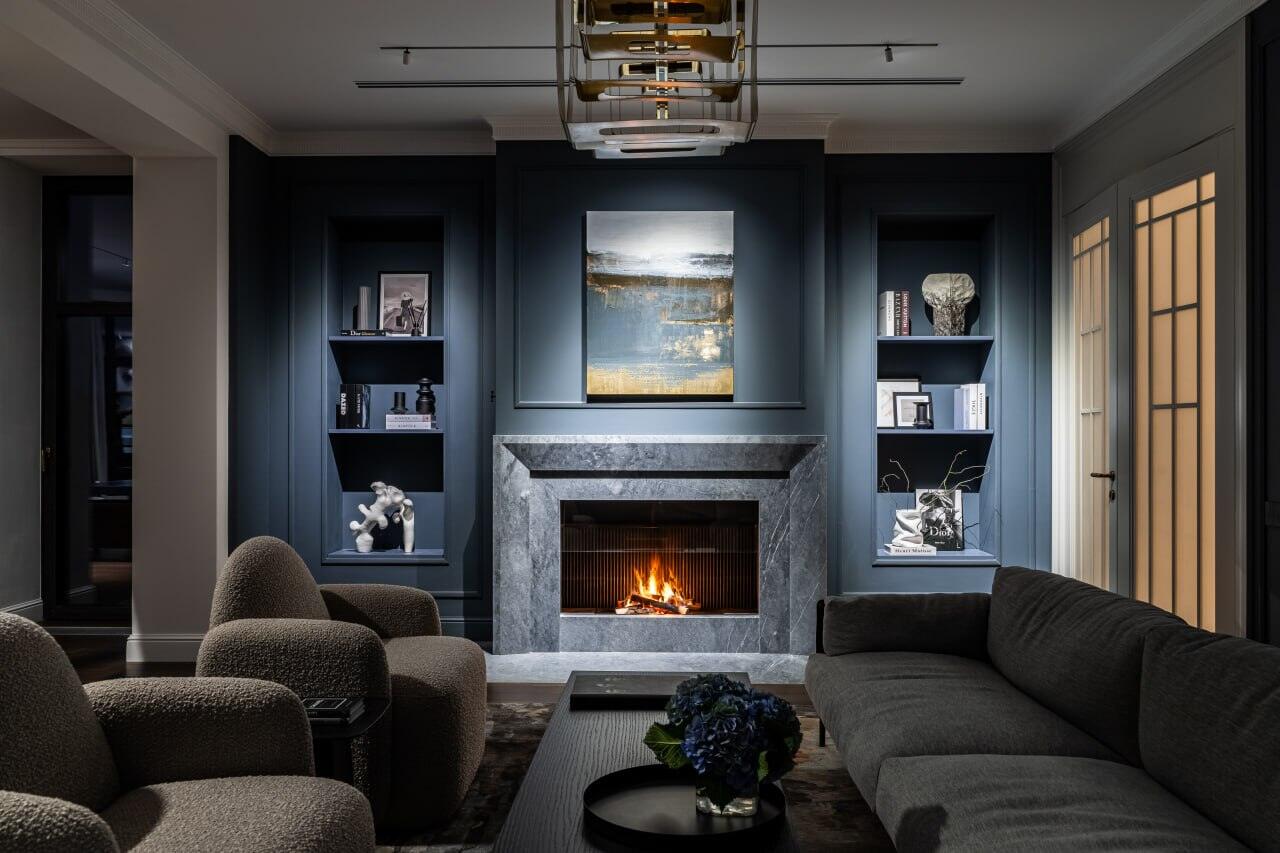 Living room with fireplace and scene lighting
